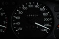 Black car panel, speedometer shows 230 km h, close-up. Speedometer needle shows maximum speed.High speed concept. Royalty Free Stock Photo