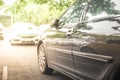 Black car in the car park. Background of cars in car parking lot Royalty Free Stock Photo