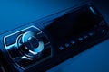 Black car radio tape recorder on black background, audio system, control panel Royalty Free Stock Photo