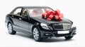 black car with a red bow Royalty Free Stock Photo