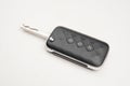 Black car remote key with three buttons on  white background Royalty Free Stock Photo