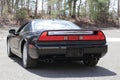 Black car on the road / 1991 Acura NSX 5-Speed 3.0-Liter VTEC V6 Berlina Black 0016 Royalty Free Stock Photo