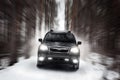 Black car speed drive on off road at winter daytime Royalty Free Stock Photo