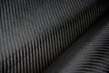Black carbon fiber composite raw material Royalty Free Stock Photo