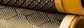 Black carbon fiber composite raw material close up Royalty Free Stock Photo