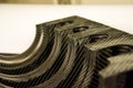 Black carbon fiber composite raw material close up background