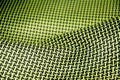 Black carbon fiber composite raw material close up background Royalty Free Stock Photo
