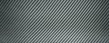 Black carbon fiber texture, vinyl film for gluing car parts Royalty Free Stock Photo