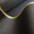 Black carbon fiber twill composite material background Royalty Free Stock Photo