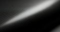 Black carbon fiber weave texture background with subtle light reflection Royalty Free Stock Photo