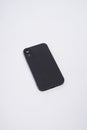 Black case for iPhone, isolated on white background. Royalty Free Stock Photo