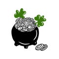 Black cast iron cauldron full of golden coins money pot with leprechaun savings. Saint Patrick\'s day, shamrock, Royalty Free Stock Photo