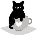 Black cat on tea cup Royalty Free Stock Photo