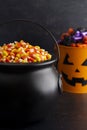 Black Cauldron For Witches FIlled with Candy Corn Royalty Free Stock Photo