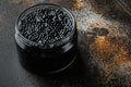 Black Caviar, on old dark rustic background Royalty Free Stock Photo