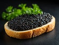 Black caviar sandwich on the table Royalty Free Stock Photo