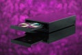 Black CD DVD burner on purple background Royalty Free Stock Photo