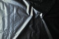 Black cellophane bag close-up background texture of plastic Royalty Free Stock Photo