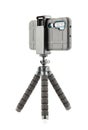 black cellphone in rugged rubber protective cover on small flexible tripod isolated on white