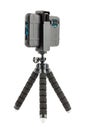 black cellphone in rugged rubber protective cover on small flexible tripod isolated on white