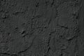 Black cement plaster smears texture as background