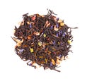 Black Ceylon tea with candied fruit, saffron, rose and cornflower petals, isolated on white background. Organic tea. Top