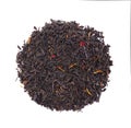 Black Ceylon tea with flower petals and bergamot, isolated on white background. Top view.