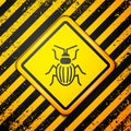 Black Chafer beetle icon isolated on yellow background. Warning sign. Vector Royalty Free Stock Photo