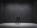 Black chair in dark interior. 3d rendering