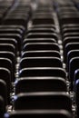 Black chairs in big empty congress room