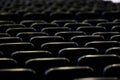 Black chairs in big empty congress room