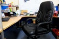 Black chairs and desk , office equipment and files Royalty Free Stock Photo