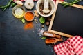 Black chalk board and spices Royalty Free Stock Photo