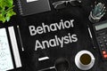 Black Chalkboard with Behavior Analysis. 3D Rendering.