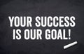 Black chalkboard with message Your success is our goal Royalty Free Stock Photo