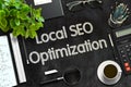 Black Chalkboard with Local SEO Optimization. 3D Rendering.
