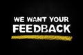 Black chalkboard showing: We want your Feedback Royalty Free Stock Photo