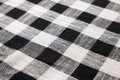 Black checkered tablecloth as background, closeup view Royalty Free Stock Photo
