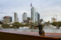 Black chess horse on the background of the skyscrapers of Frankfurt on Main. Germany Royalty Free Stock Photo