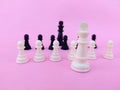 Black chess pieces like king,pawn and white chess