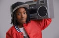 Black child, confidence and portrait with radio for hip hop, rap and swag dance with cool clothes in studio. Youth, teen Royalty Free Stock Photo