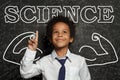 Black child smart student boy pointing at Science inscription