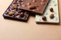 Black chocolate with hazelnuts, white and milk chocolate with al Royalty Free Stock Photo