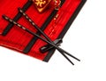 Black chopsticks on red bamboo mat. Chinese new years lucky char Royalty Free Stock Photo