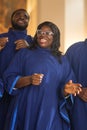 Black Christian Female Gospel Singer Singing, Happy to be Spreading the Love of Lord Jesus Christ Royalty Free Stock Photo