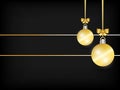 Black Christmas background. Two Hanging Golden ribbon ball decoration with gold bow including blank space for your text. Royalty Free Stock Photo