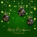 Black Christmas balls and gold stars on green knitted background