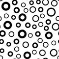 Black circle seamless pattern with hand drawn thick and thin outline rings. Vector chaotic monochrome texture with round Royalty Free Stock Photo