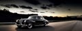Black classic vintage old car passing by on the freeway Royalty Free Stock Photo