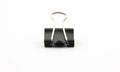 Black clerical clip for paper on white background Royalty Free Stock Photo